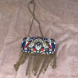 Bcbg clutch with tassels